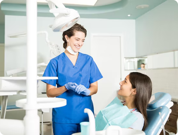 Medical professional assisting a patient in a dermatology clinic